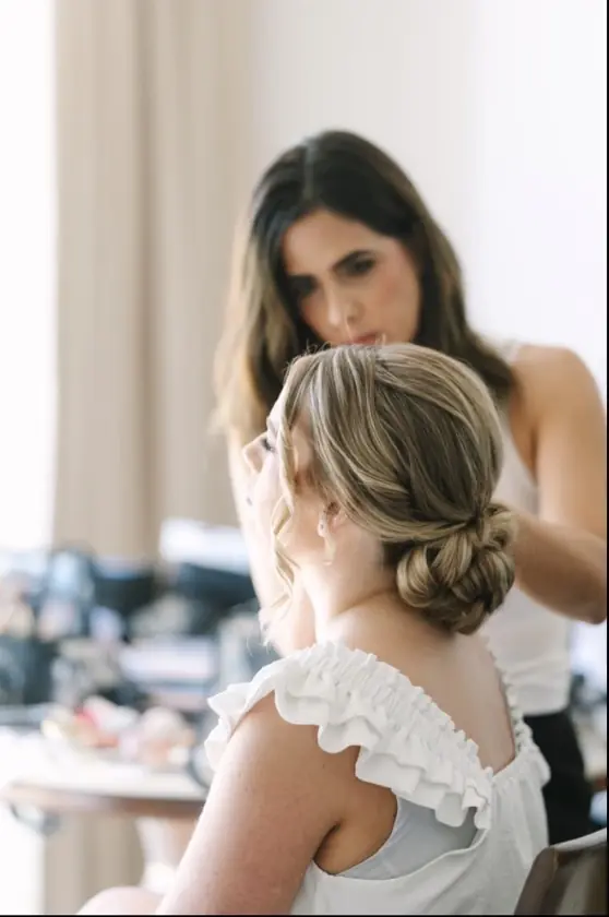 Sara Tamargo styling an elegant bridal updo
