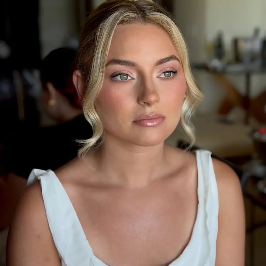 Soft luminous bridal makeup designed to highlight green eyes